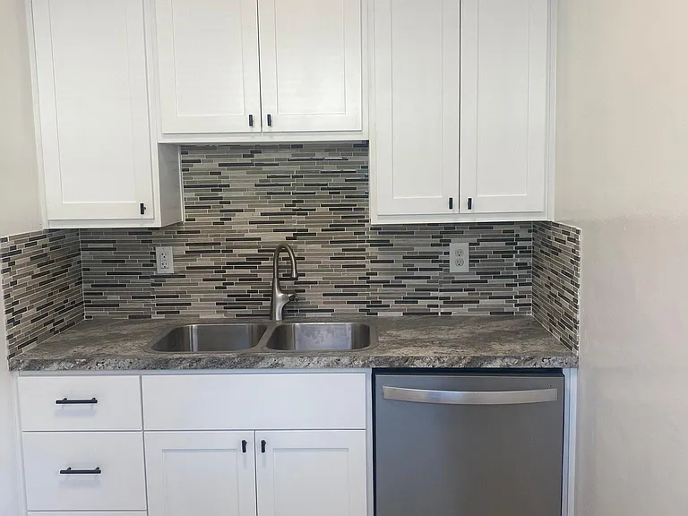 Kitchen with dishwasher new cupboards dual basin sink