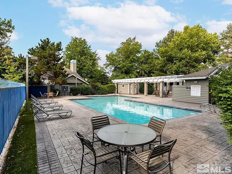 Community pool, steps away from the home.