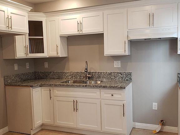 3rd image of 2063 W Florence Ave Back 1