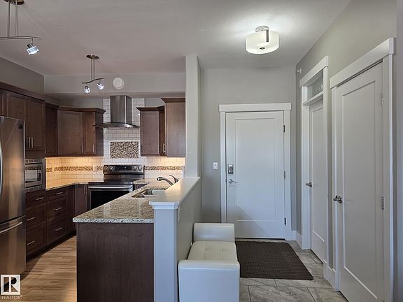 2nd image of 5201 Brougham Dr #407