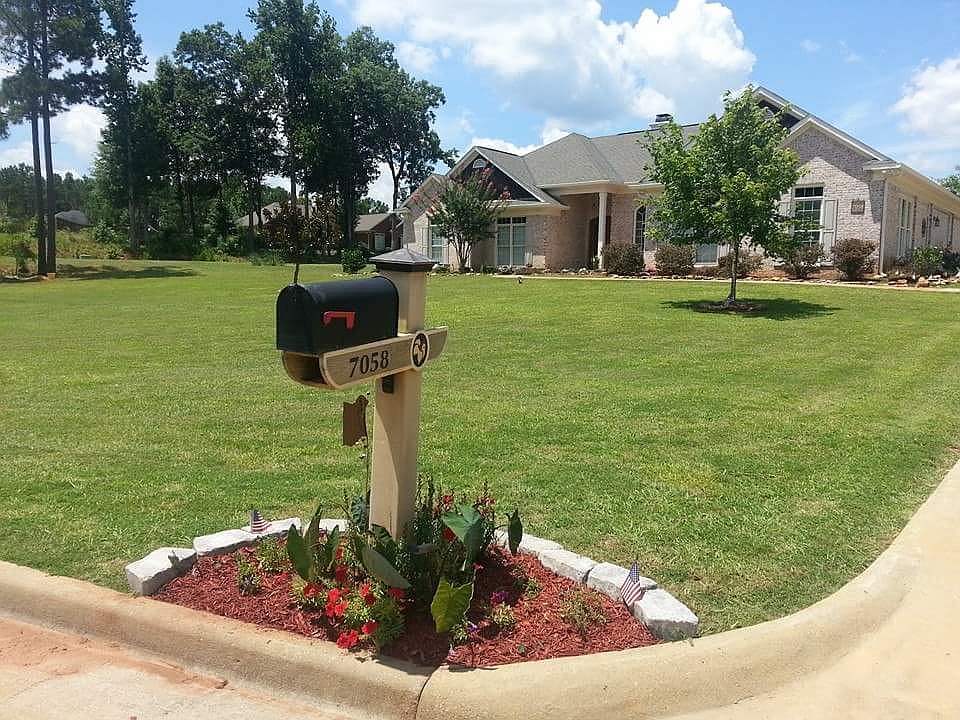 Front view of the home in su