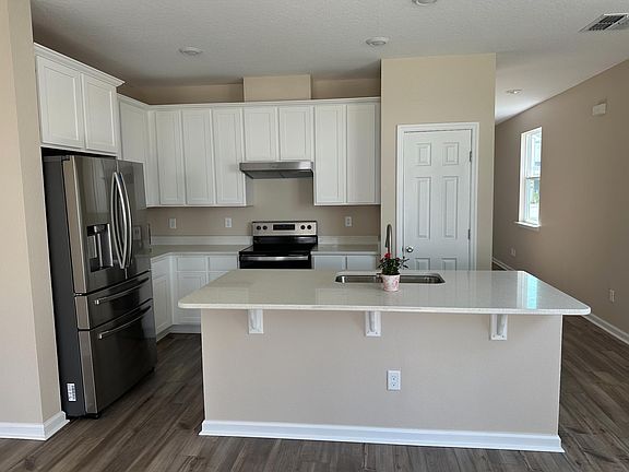 4th image of 9869 Fiddleback Ln