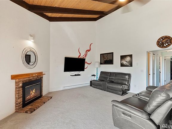 The living space is large and even has a real wood burning fireplace. 