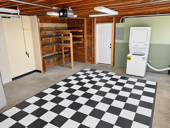 Interior of the oversized garage with Washer and Dryer.
