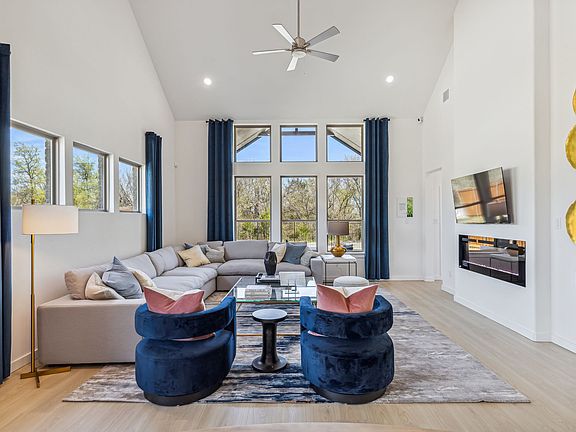 Living Room in the Van Gogh II home plan by Trophy Signature Homes - REPRESENTATIVE PHOTO