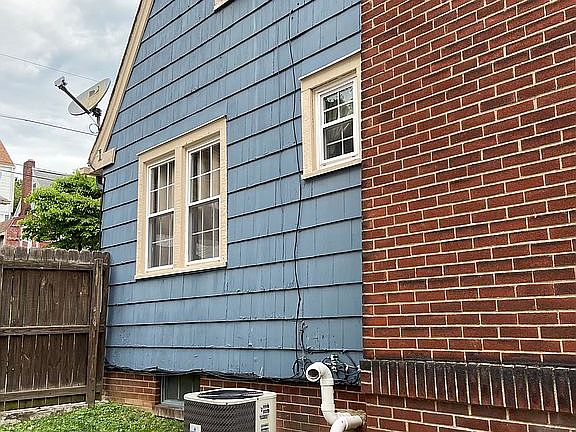 Side of House and AC Unit