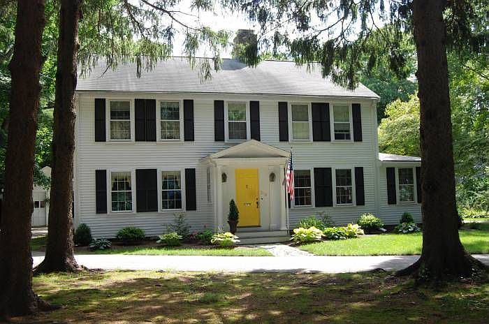 Front of house thru trees