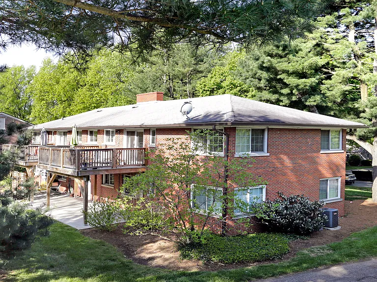 This is a good view of the deck for this apartment. We installed outdoor faucets so you could easily water your container plants and electrical outlets for party lights. The decks are sturdy and made of trex flooring