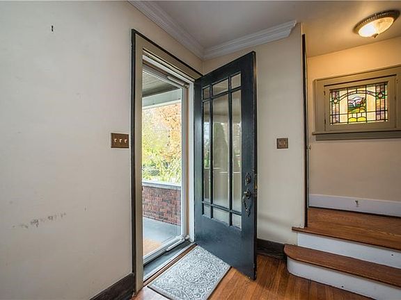 Magnificent front door floods the living room with natural light.