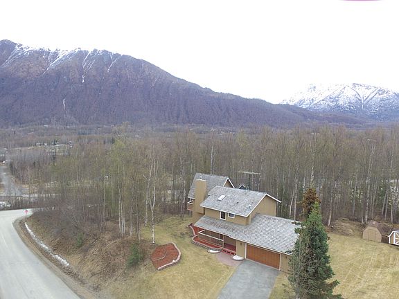 Aerial Front w mountain