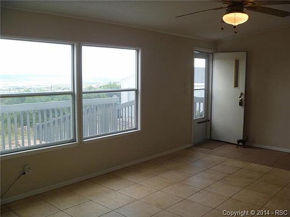 Front entry into the tiled living room