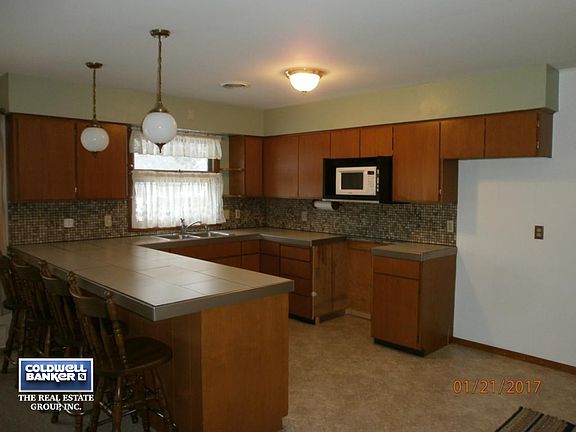 Wood cabinets ,new countertop