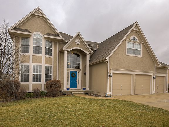 Huge window above the door