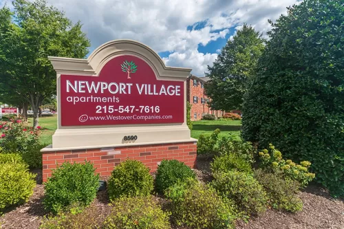 Entrance Sign - Newport Village Apartments