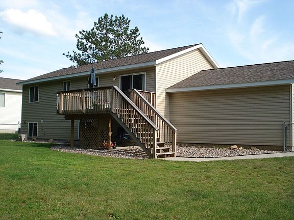 Large fenced in backyard and nice deck.