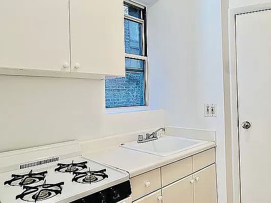 5th image of 219 E 10th St APT 4B