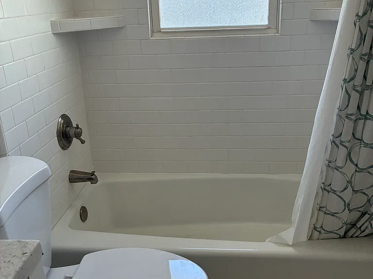 low bathtub nothing crazy in heights. Easy to get in and out.