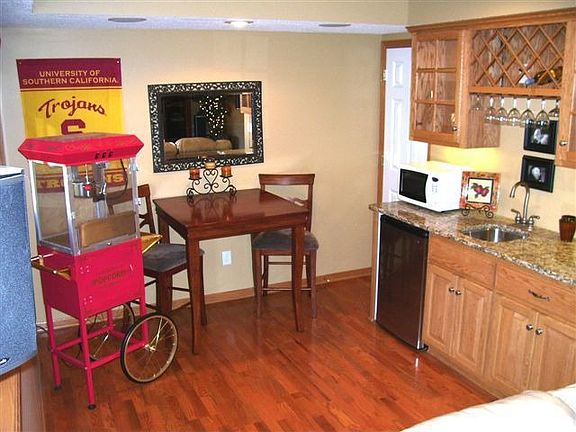 Finished lower with amusement room, hardwood and more!