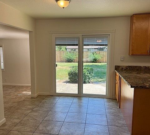 Dining Room/Kitchen with New Patio Door with Privacy Screen
