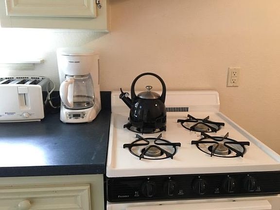 Feel like eating in? Cooking for friends? There is a gas range/oven. Pots and pans, plates and glasses are all there.