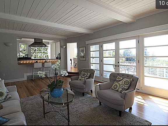 Looking from living area into kitchen and ground floor deck