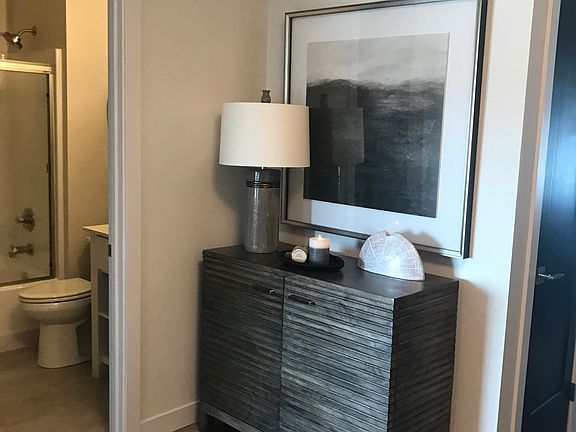 Front entry way with convenient bathroom to the left.