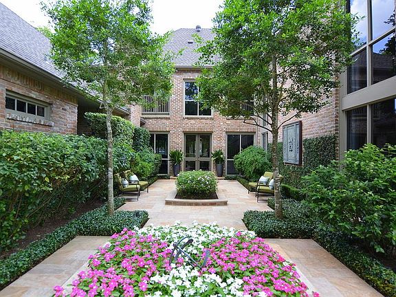 ~ One of the Courtyards is viewed from the Entry, Master Suite, Secondary Bedrooms and Family Room ~