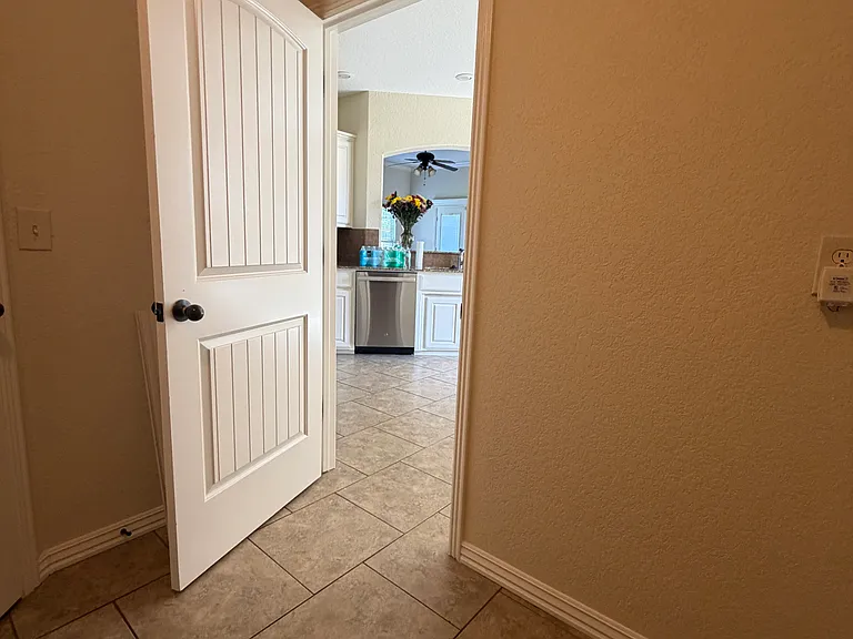 dryer room entering kitchen