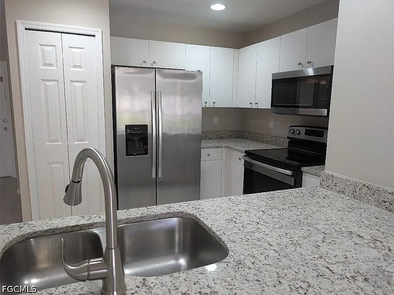 2933 Santa Barbara Blvd #201 — Photo 4