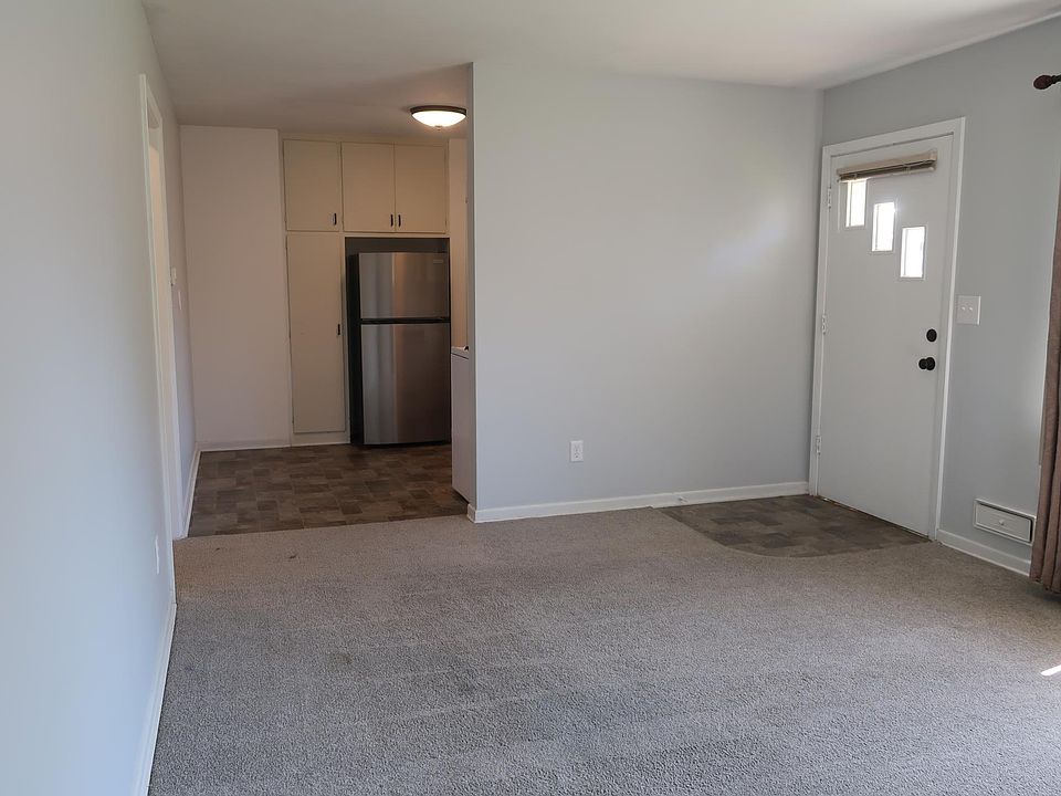 Living room facing towards kitchen
