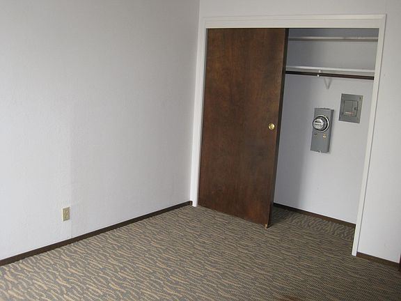 Bedroom with wall in closet