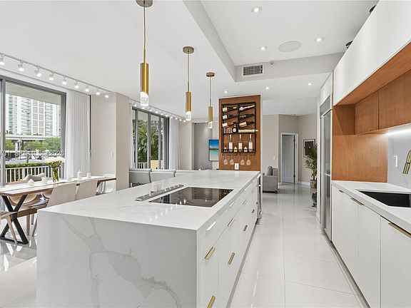 3rd image of 3500 Mystic Pointe Dr APT 104