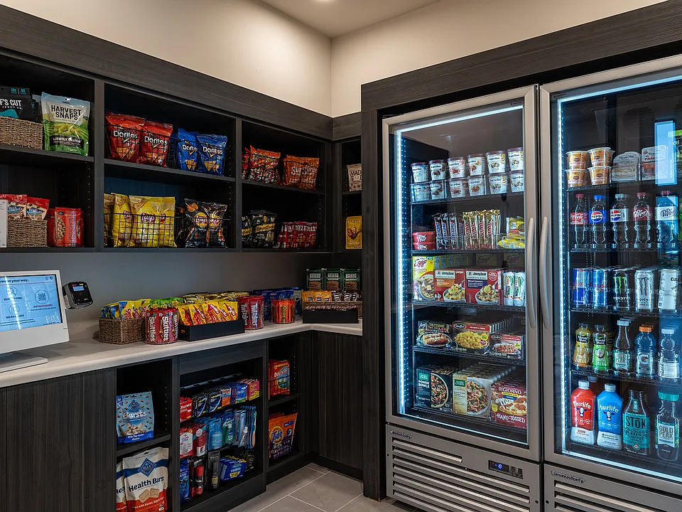 Explore the convenient snack and refreshment area in this luxury apartment community.