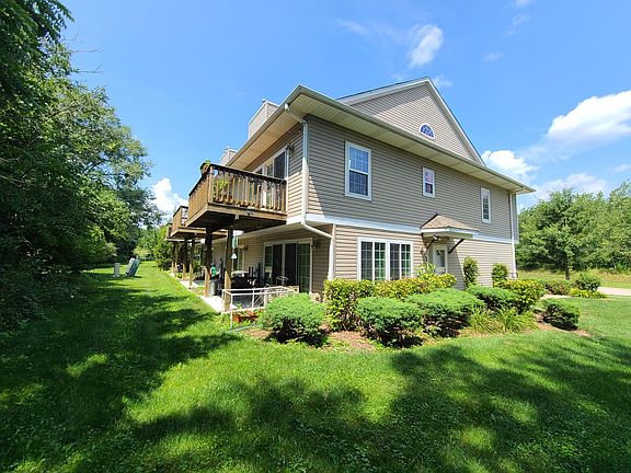 2nd story balcony and ground floor concrete patio