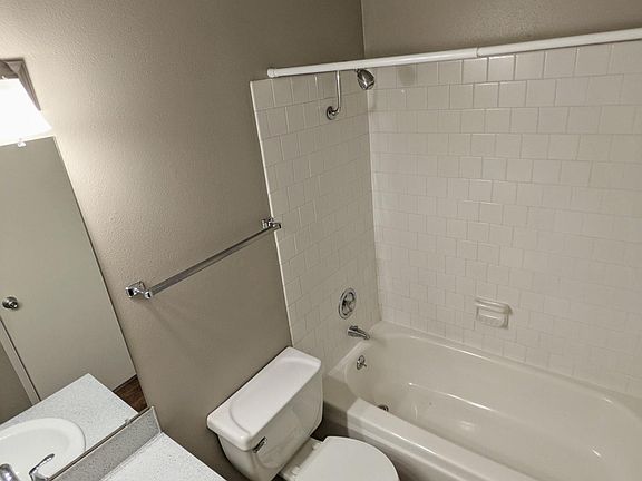 Bright bathroom with updated fixtures.
