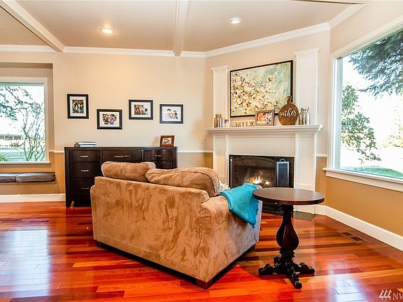 One of the two cozy fireplaces on the main level