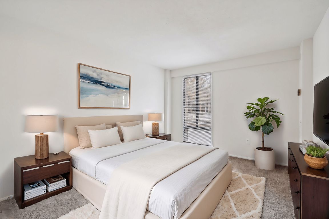Bedroom with natural light and closet space