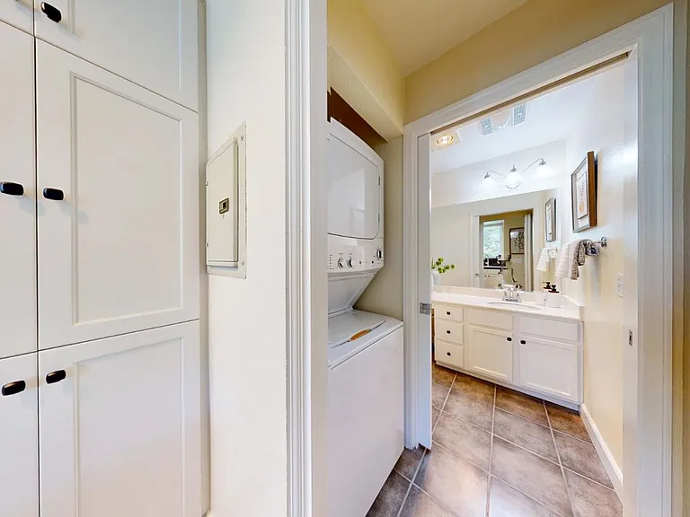 Washer and dryer. Half bath in the back.