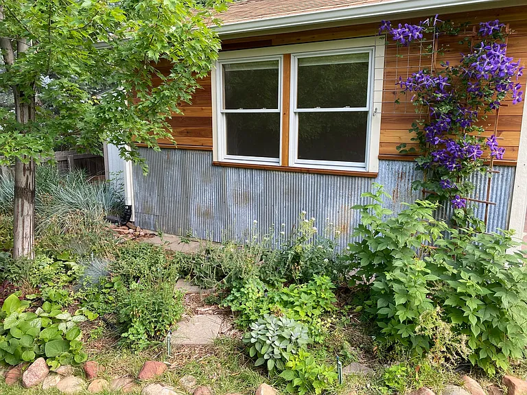 additional detached studio, perfect for year round home office, exercise room, or additional space.