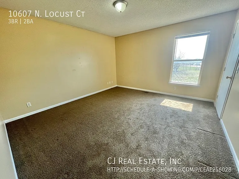 10607 N Locust Ct — Photo 4