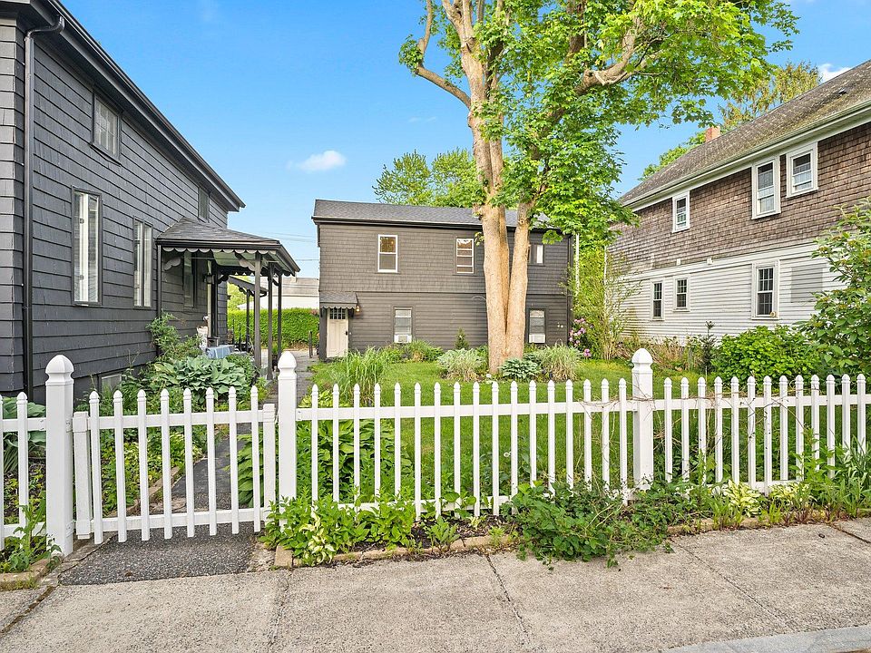 Exterior: Front door with yard.