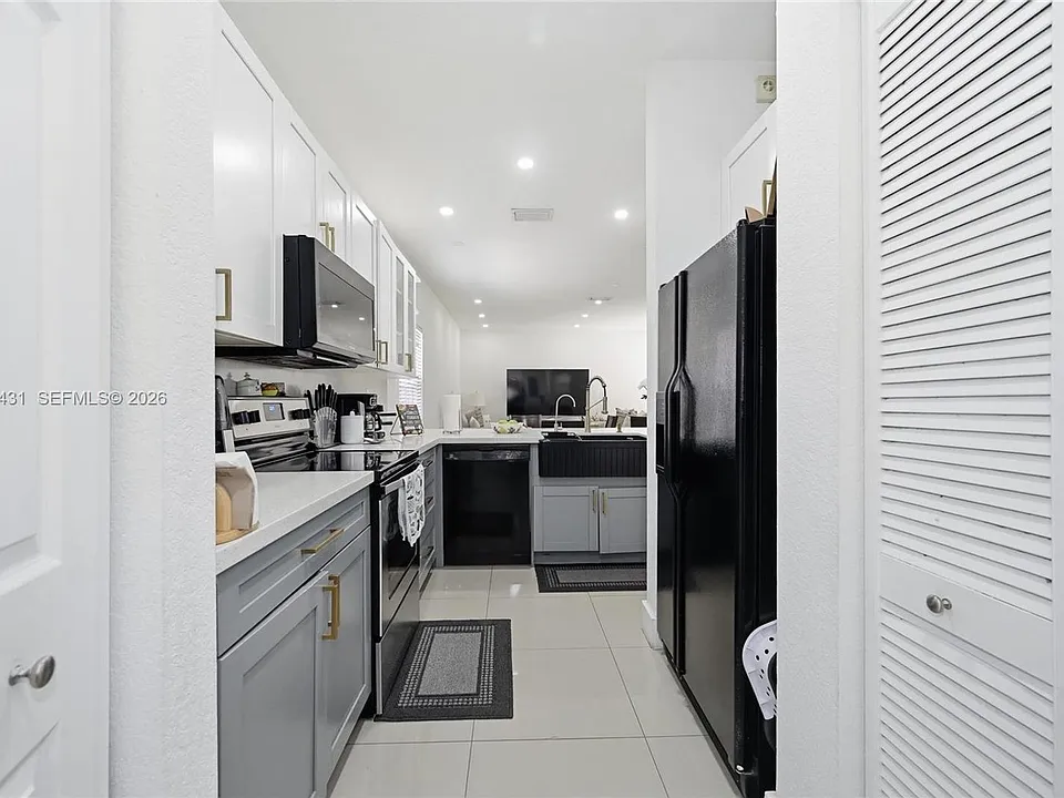 14030 SW 49th St #10