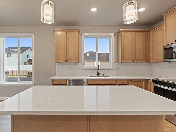 7104 S Hyton ST by Aho Construction