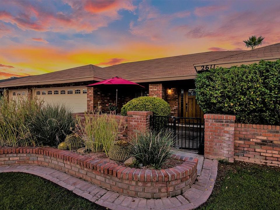 3 Car Garage and Detailed Courtyard
