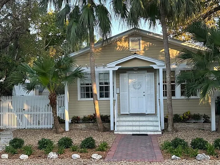 Conch style home with off street parking.