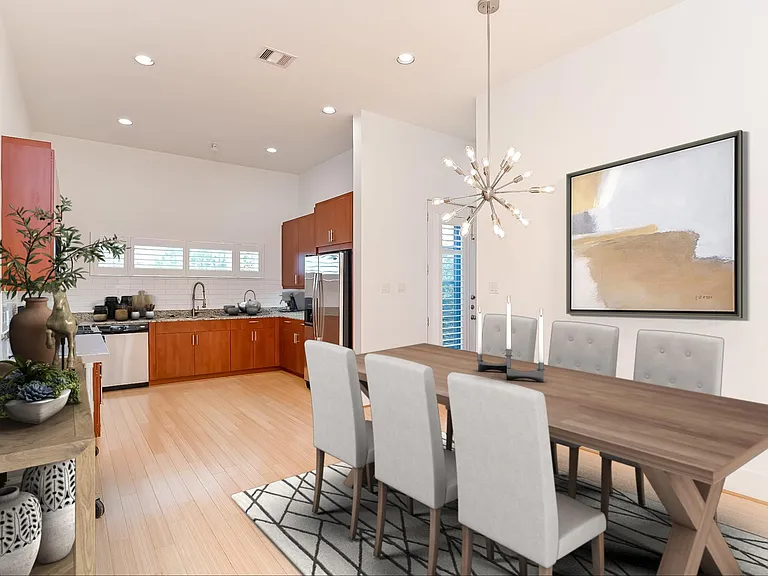 Open concept kitchen and dining area with LED lighting, 2 large pantries, and lots of space.