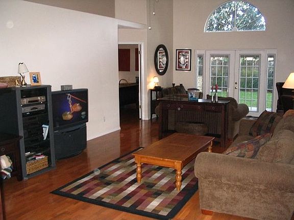 Family Room with Hardwood Floors and French Doors