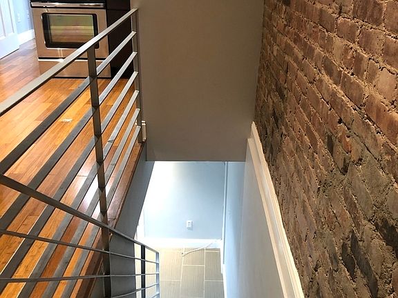 4th image of 27 E 7th St APT 1W