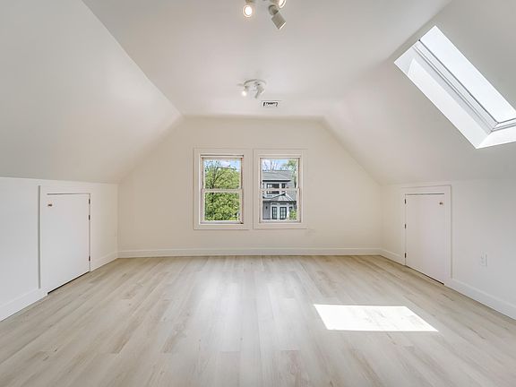 Super large Master Bedroom with tons of storage space and skylight