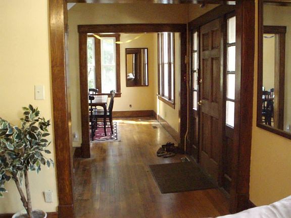 The main floor has the master kitchen, dining room, living room, library, and a half bath with a laundry room.
